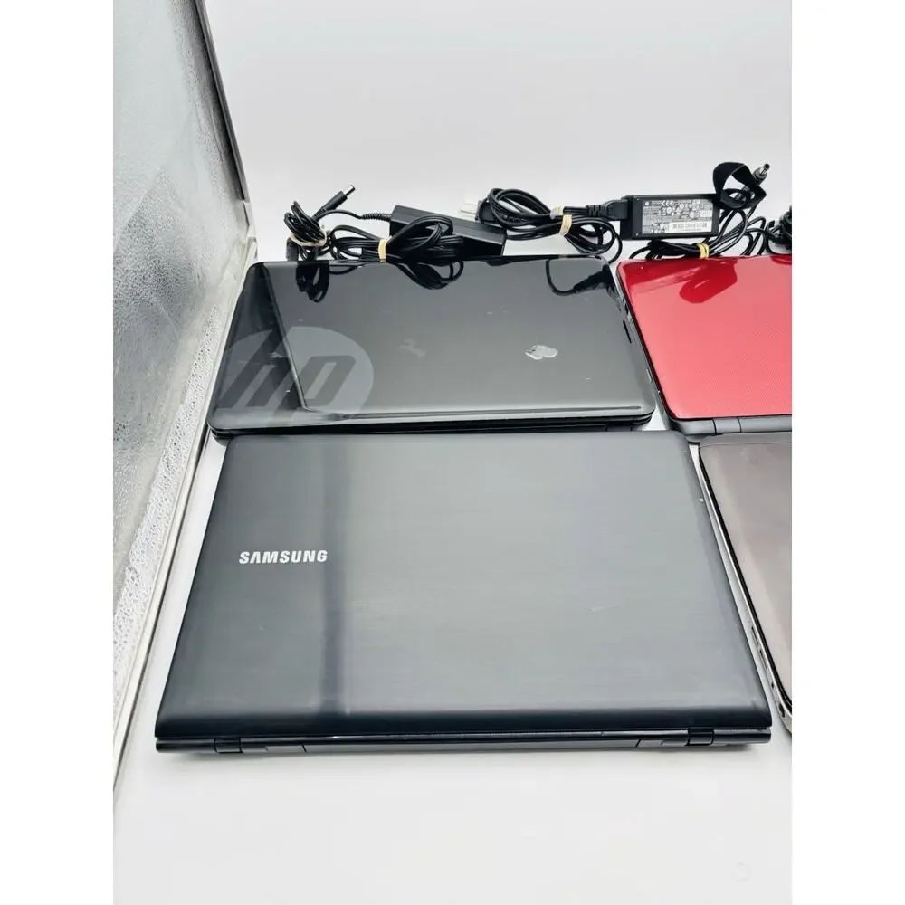 3 HP Laptop Computers With Cords. And 1 Samsung Laptop For Parts And Repair.